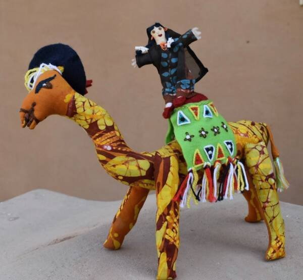Badaweya W Abu Ta'eya - The Bedouin doll who rides a hat wearing camel